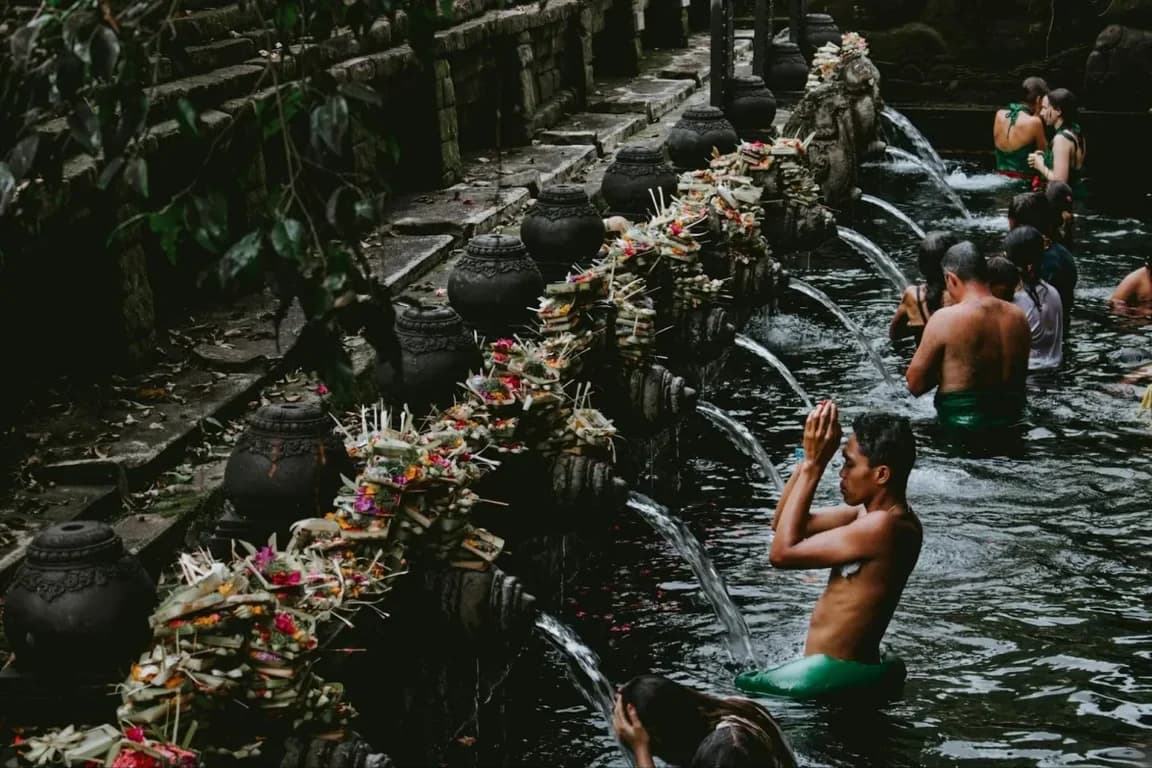 People melukat in tirta empul temple